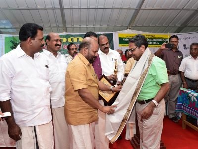 Venukumar receiving Award from Agri. Minister